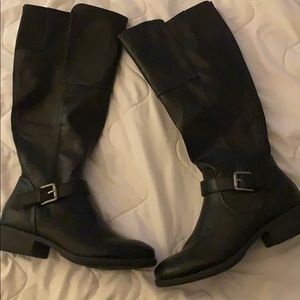 Never worn black boots.